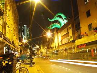 Illustration for article titled Giant Green Tentacles Attack Buildings from the Inside